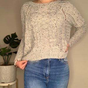 Knit white sweater with black speckles